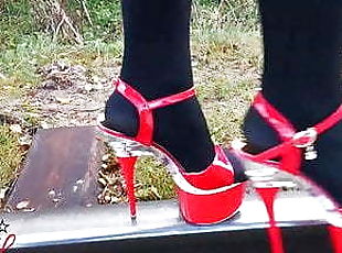 Lady L sexy walking with extreme red high heels.