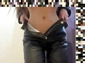 latina striptease with her leather clothes