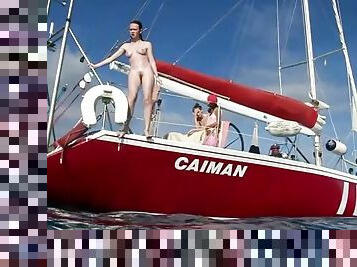 Redhead skinny dipping off a boat