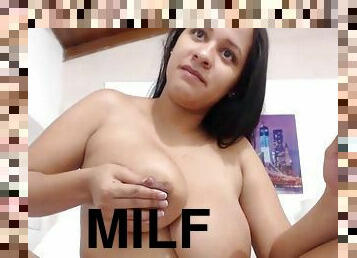 Latin milf giving lotion to big boobs live