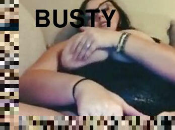 Busty girl masturbates with dildo