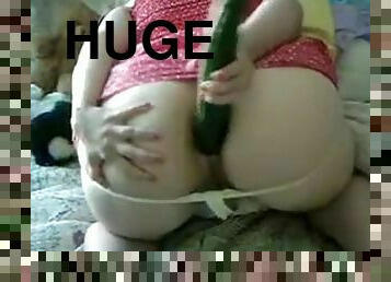 Huge tits white girl plays w huge cucumber