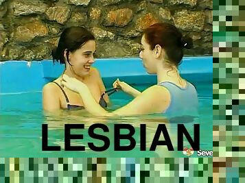 Two horny teens reveal their lesbian side at the poolside