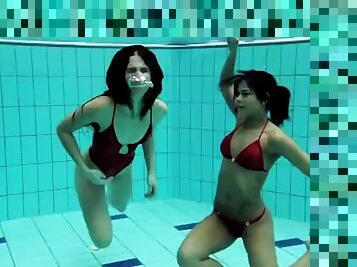 Lesbian fun underwater and naked stripping