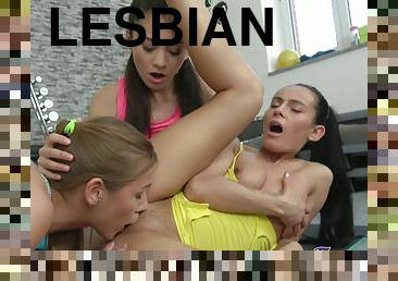 Sporty teens have a hot lesbian threesome after a workout.