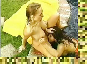 Big tit lesbians in pool