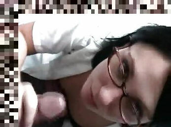 Cock stroking teen takes a facial on her glasses