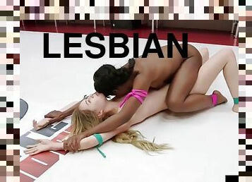 Wrestling lesbians rub in the ring during the fight