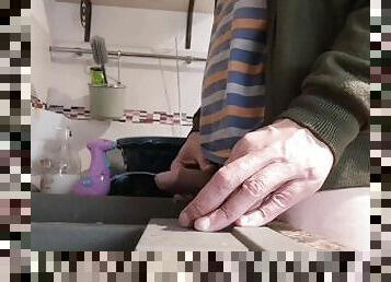 Jerking, cumming and pissing into the kitchen sink