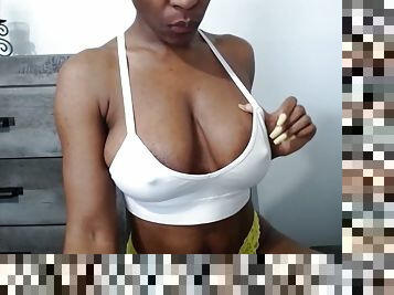 Ebony cam girl shows off her big boobs and black nipples