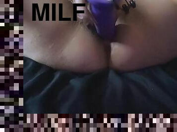 Milf uses big purple dildo