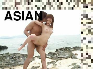 Naughty Asian milf in bikini, Rino Kirishima gets sex on the beach