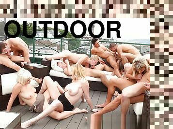 Sluts fuck on rooftop outdoors