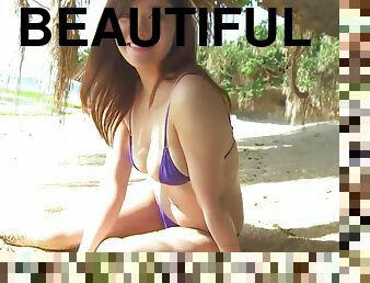 Beautiful girl on the beach - Watch full here