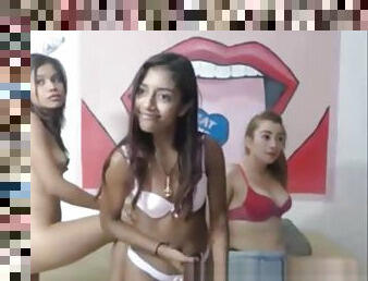 Three cute teens kissing and teasing