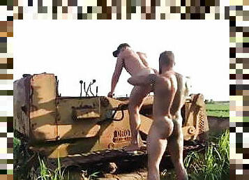 Muscular couple fuck bareback out in the farm