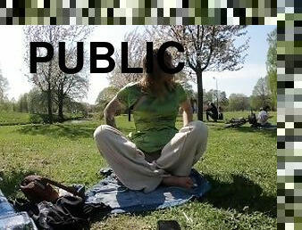 changing clothes in a public park