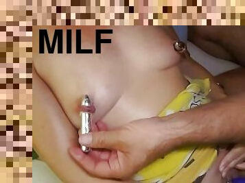 nippleringlover hubby inserting turned on mini vibrator in my large gauge stretched nipple piercings