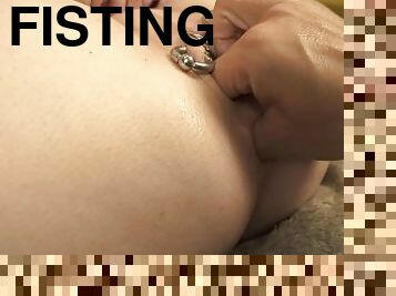 hand fisting of pretty pierced pussy punching inside