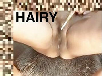 Masturbating  hairy pussy with hard, sharp, pointed metal! Mature bbw Latina woman