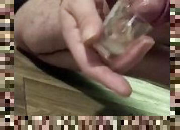 Soft cock cums in shot glass, then cum dump for more strokes