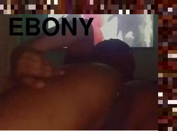 Ebony teen showing fat pussy while watching tv