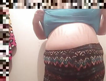 Round gut bbw shows off belly