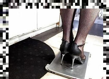She crushed her bossmans laptop in sexy high heels