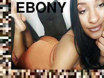 Exotic Ebony In An Elegant Dress Bares Her Beautiful Black Feet On The