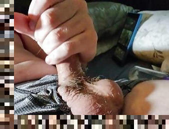 Sexy man jerking off with lube after work. Close up cumshot