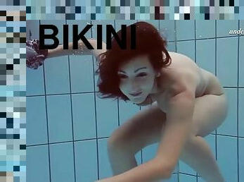 Hot girl sima shows her seductive pussy while swimming underwater