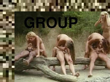 Group of young retro guys and chicks are having classic group fuck at vintage beach