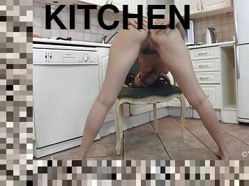 A Orange Dressed Melody Strips And Enjoys Kitchen