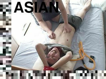 Tied-up Asian dude gets pleasured by his girlfriend