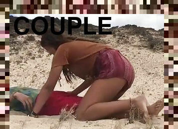 Couple fucking on the beach