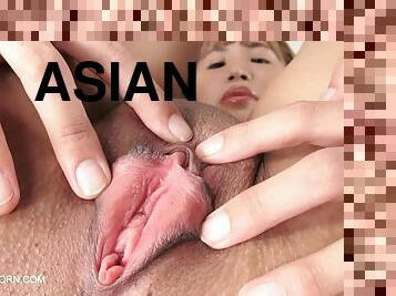 Blond asian babe show her small pussy real closeup