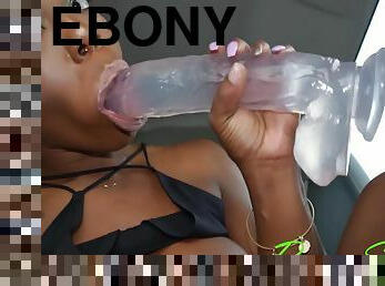 Ebony busty babe blows giant dildo