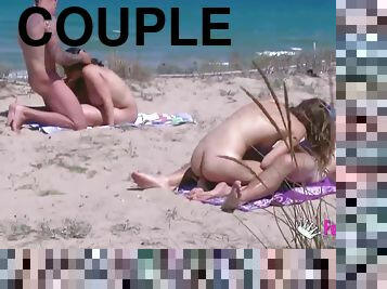 A couple gets caught on a spy camera having sex on the nude beach