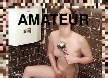 Beautiful girlfriend masturbates while taking a shower