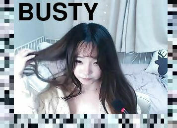 Hot busty asian camgirl masturbates