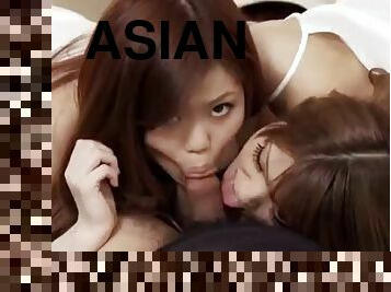 Two asian girls sharing a dick