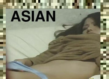Giant Asian rubs her pussy
