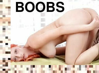 Redhead with full gorgeous boobs solo