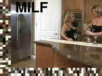 Wine drinking milfs eat pussy in the kitchen