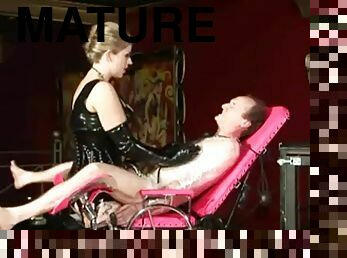 Hot blonde mistress dominates slave