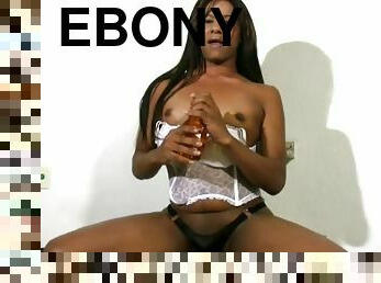Ebony naughty t-girl strokes her extreme black mamba shecock