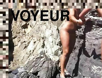 Nudist female with big clit nude on beach voyeur cam