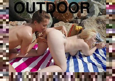 Aroused babes use the outdoor sunny beach for pure lesbian intimacy