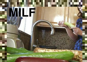 MILF washes a cucumber and ends up masturbating with it