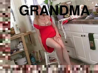 Blonde grandma strokes her shaved pussy and cums
